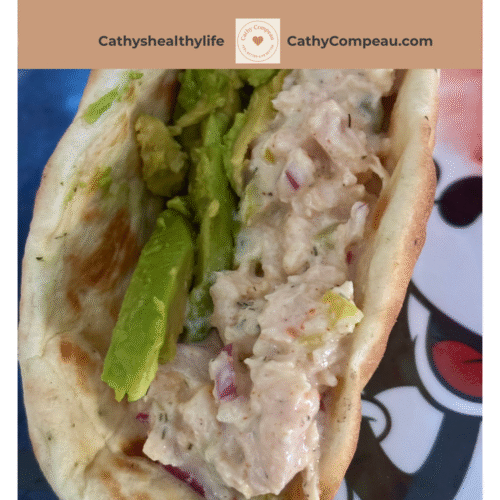 High Protein Chicken Salad in a pita with. Avocado sliced