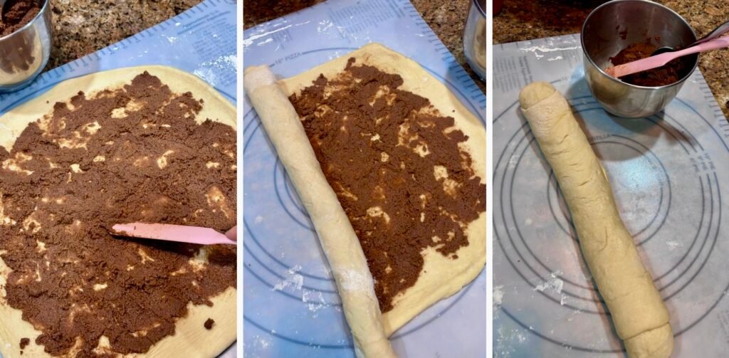 Cinnamon roll dough rolled into a rectangle on a floured surface