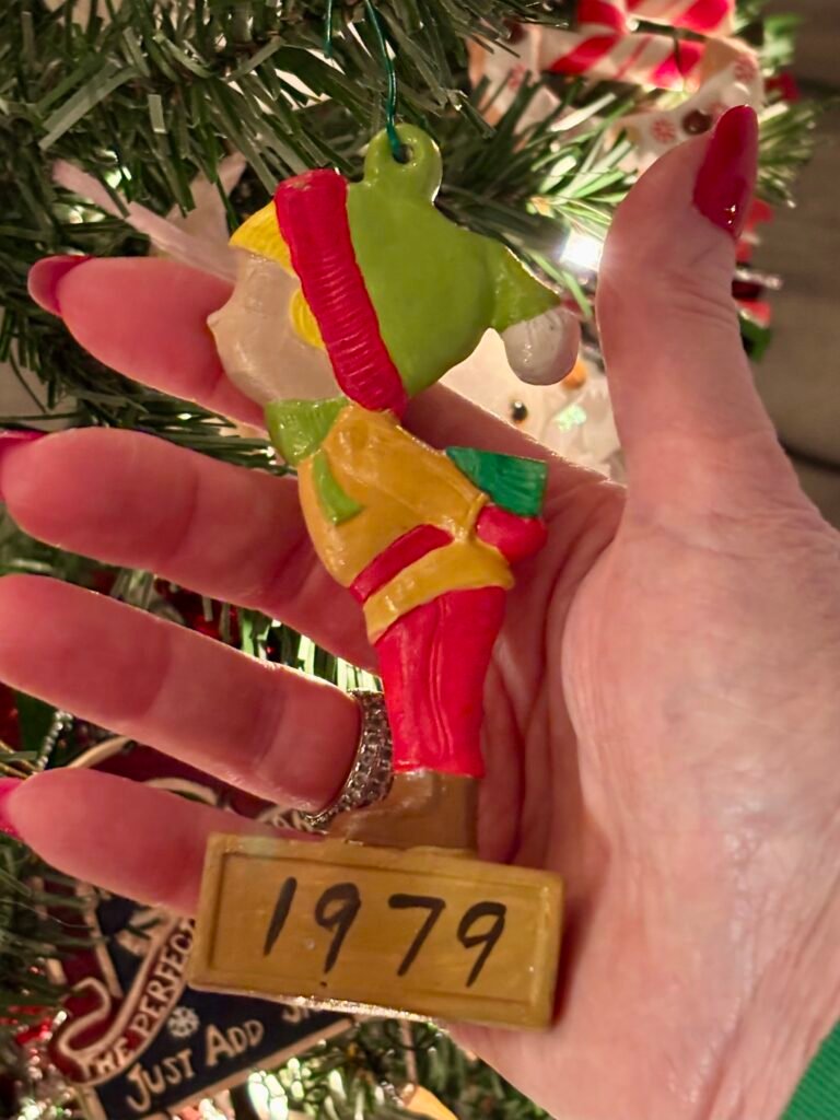 Vintage Christmas ornament of a girl named Cathy from 1979. 