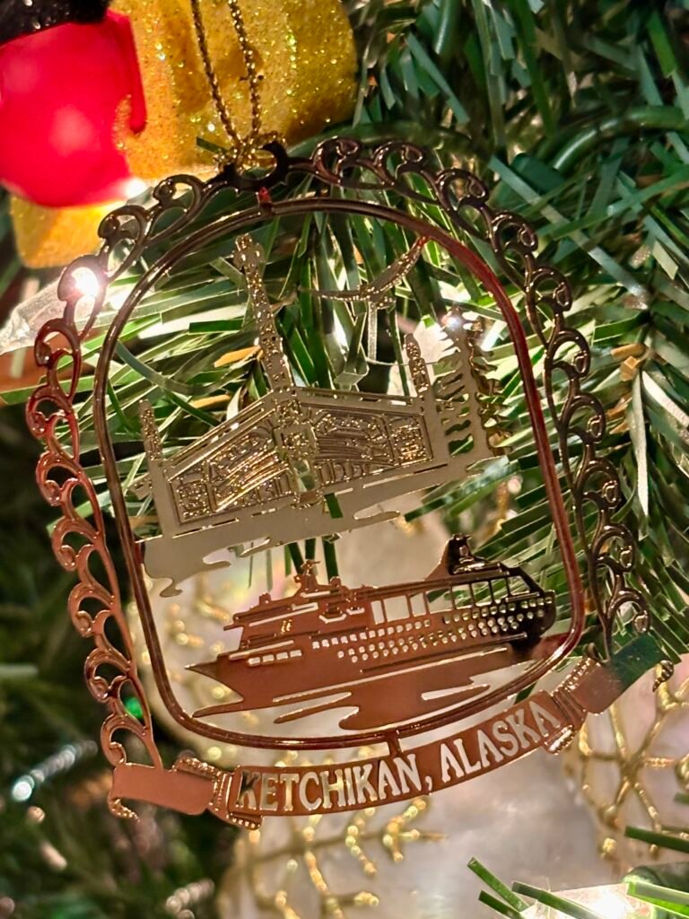 Gold detailed Christmas ornament from Ketchikan, Alaska from 2013