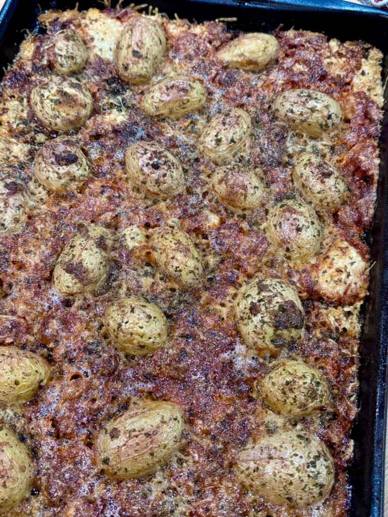 Garlic Parmesan potatoes baked until golden brown and crispy