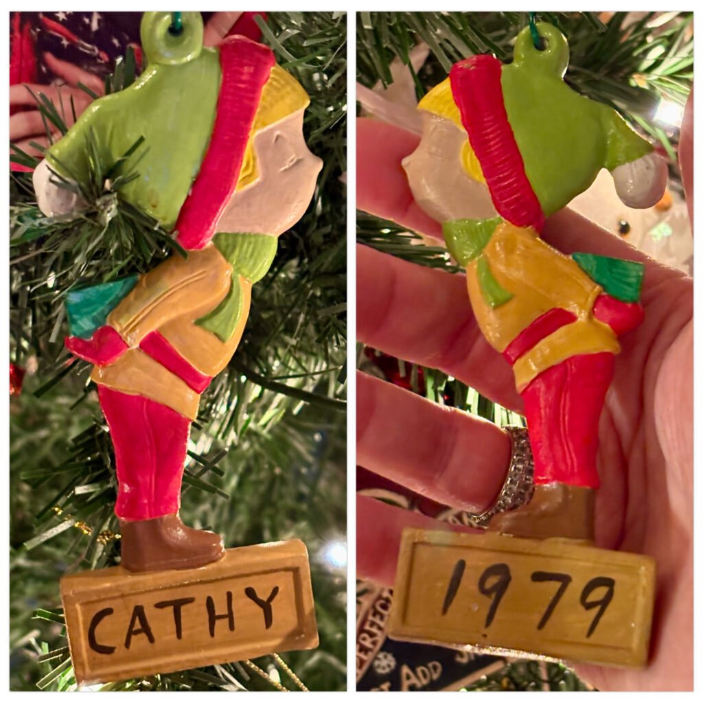 Vintage ceramic Christmas ornament from 1979 of a girl named Cathy. 