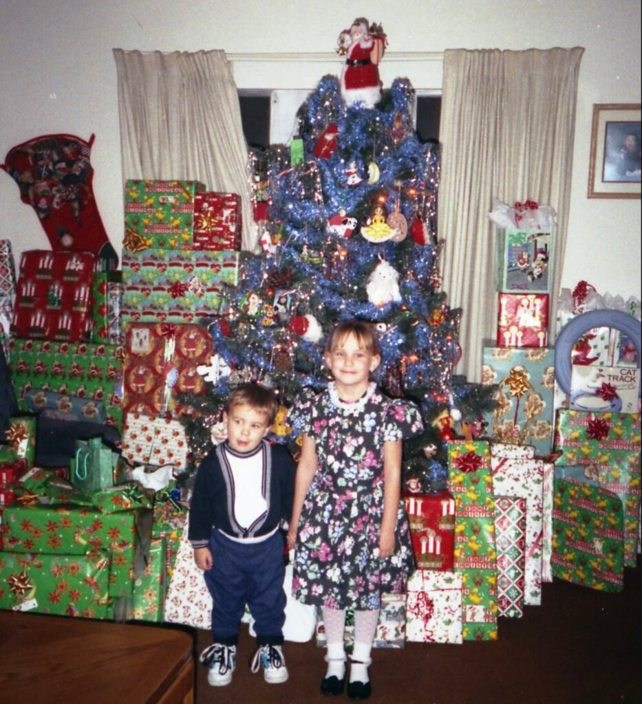 Two happy kids on Christmas morning. 