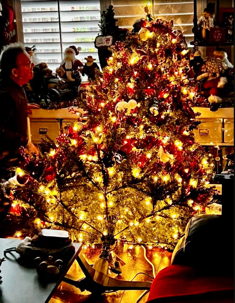 Christmas tree ell over fully decorated