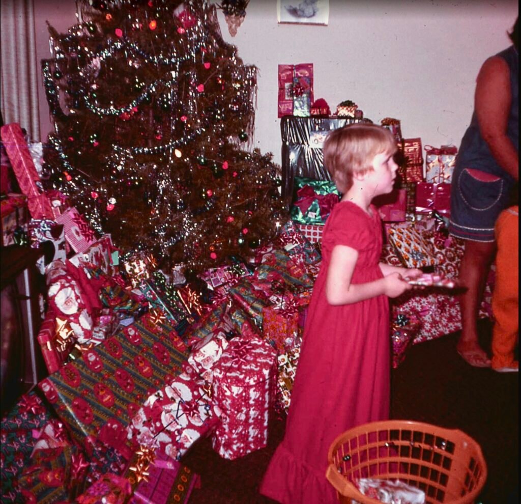 Christmas gift around the tree in 1970s