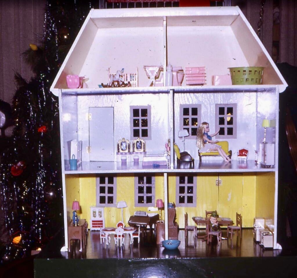 Inside of a wood dollhouse made by grandpa in the 1970s