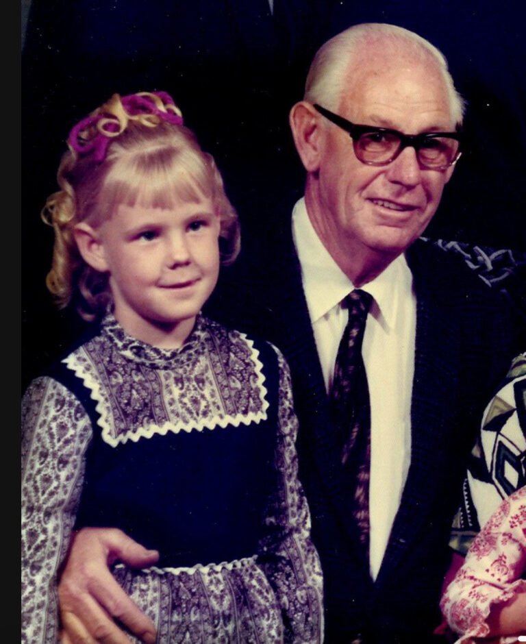 Grandfather and granddaughter at christmas