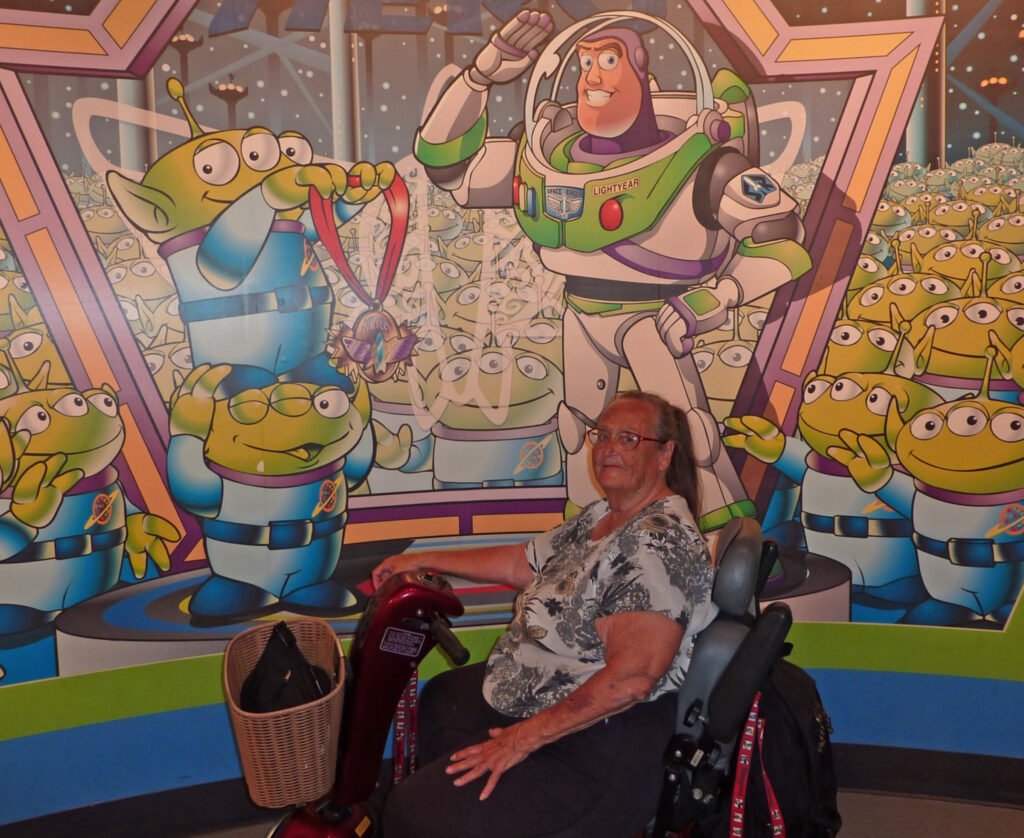 Grandma at Disneyland in a wheelchair