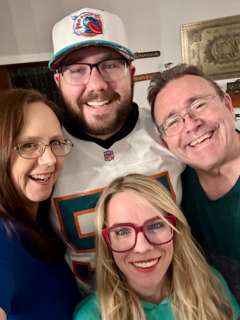 Mother, father and son celebrating his birthday