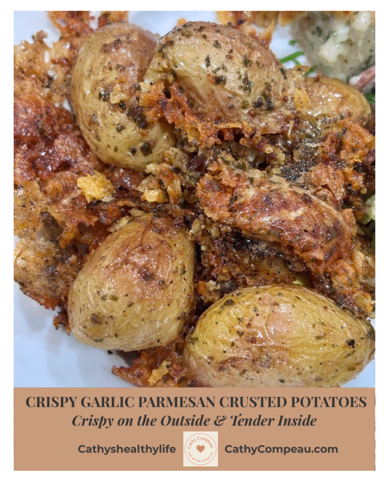 Crispy garlic parmesan crusted potatoes with golden crust and tender centers on a white plate