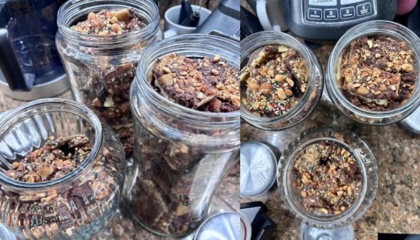 Glass jars filled with Christmas crack for holiday treats.