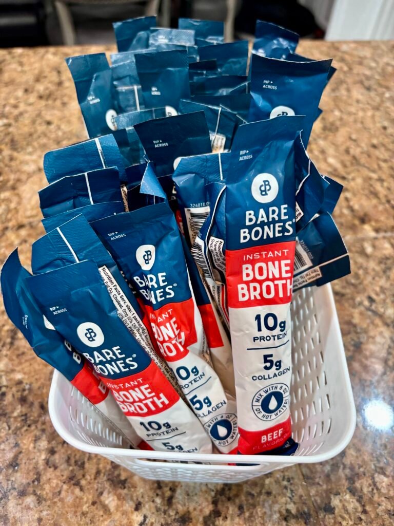 Bare Bones beef broth packets in a basket. 